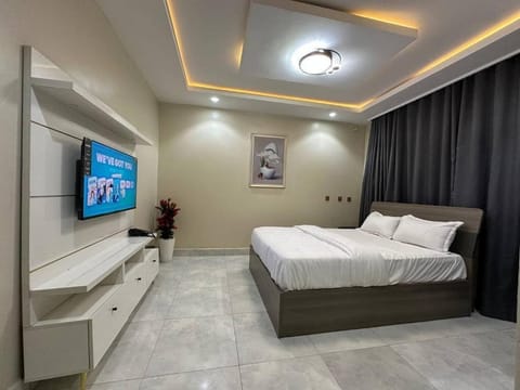 Economy Apartment, Balcony, City View | In-room safe, desk, laptop workspace, blackout drapes