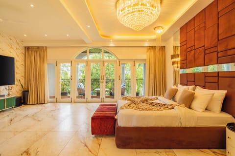 Deluxe Villa | Living area | Flat-screen TV