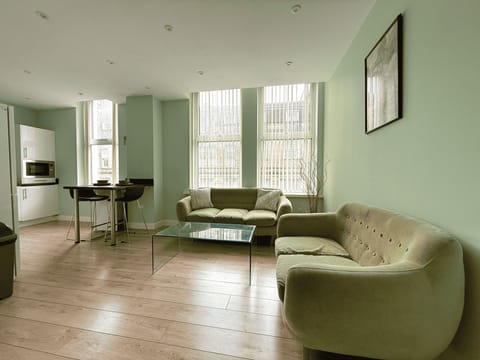 Standard Apartment | Living area | 40-inch LED TV with cable channels
