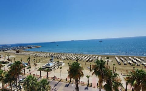 On the beach, sun loungers, beach umbrellas