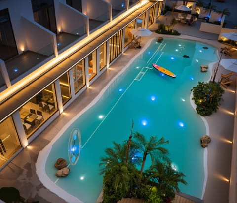 Outdoor pool, open 10:00 AM to 10:00 PM, sun loungers