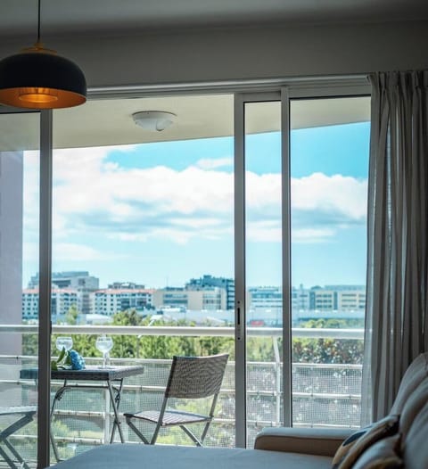 Comfort Apartment, Balcony, City View | Living area | Flat-screen TV