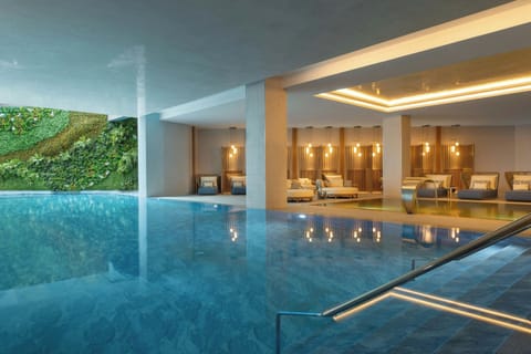 4 indoor pools, seasonal outdoor pool, pool umbrellas