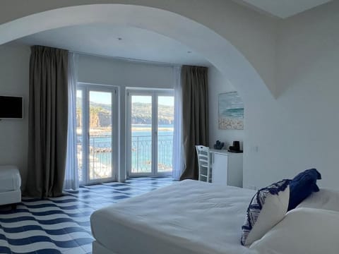 Deluxe Triple Room, Sea View | In-room safe, blackout drapes, iron/ironing board (on request)