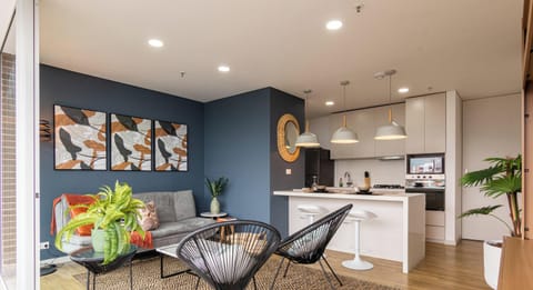 Apartment, 1 Queen Bed with Sofa bed, Balcony, City View | Living area | 55-inch flat-screen TV with digital channels