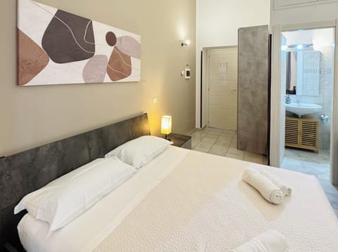 Standard Triple Room | Blackout drapes, iron/ironing board, free WiFi