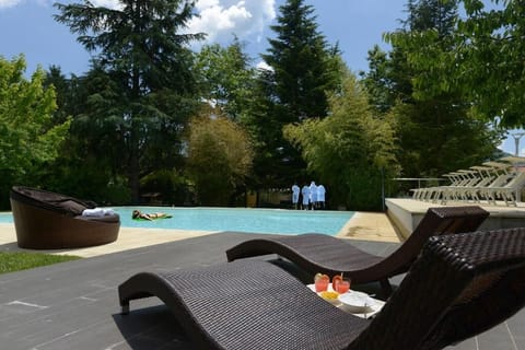 Indoor pool, outdoor pool, open 9:00 AM to 8:00 PM, sun loungers