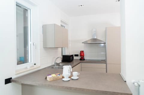 Apartment (2 Bedrooms) | Private kitchen | Espresso maker, microwave, oven, stovetop