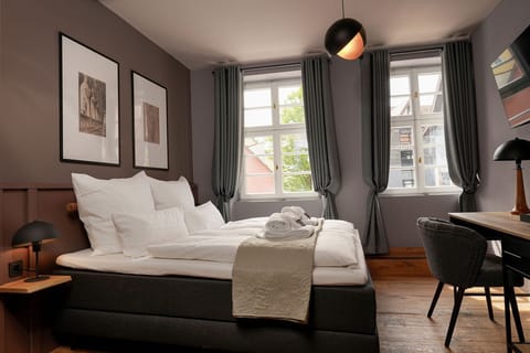 Triple Room | In-room safe, desk, laptop workspace, blackout drapes