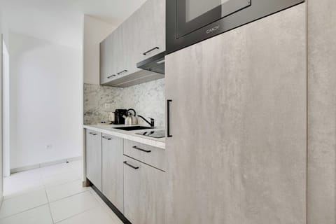 Apartment | Private kitchen | Fridge, microwave, stovetop, dishwasher