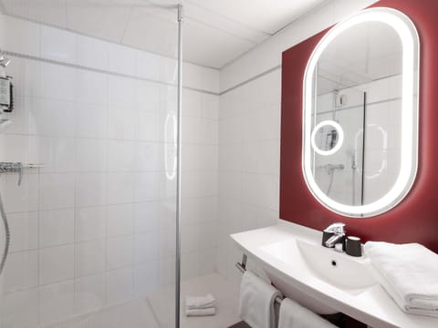 Eco-friendly toiletries, hair dryer, towels