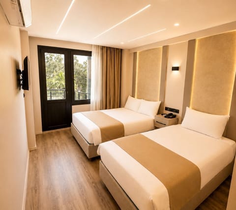 Family Twin Room, Balcony | Individually decorated, desk, laptop workspace, free WiFi