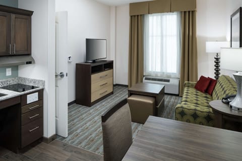 Desk, laptop workspace, blackout drapes, free cribs/infant beds