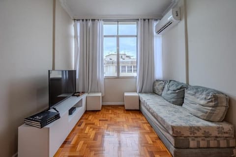 Apartment | Living area | 32-inch TV with cable channels, streaming services