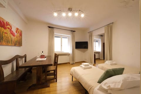 Comfort Apartment, City View | Living area | 80-inch flat-screen TV with digital channels
