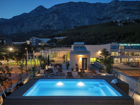 Outdoor pool, a heated pool, open open 24 hours, sun loungers
