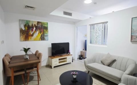Comfort Apartment, Balcony, Beach View | Living area