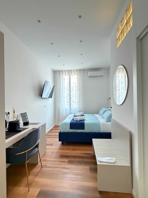 Standard Double or Twin Room, Private Bathroom | In-room safe, desk, laptop workspace, blackout drapes