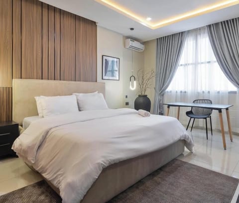 Economy Room, Balcony, City View | Desk, laptop workspace, blackout drapes, soundproofing