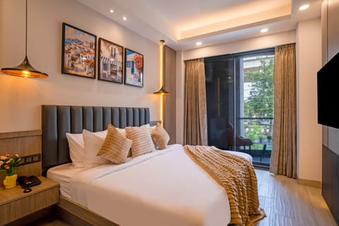 Deluxe Double Room, City View | In-room safe, desk, laptop workspace, blackout drapes