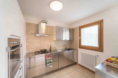 Family Villa (beach access included) | Private kitchen | Fridge, highchair