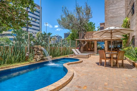 Outdoor pool, open 8:00 AM to 8:00 PM, sun loungers