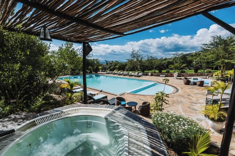 Outdoor pool, open 8:00 AM to 6:00 PM, pool umbrellas, sun loungers