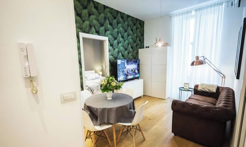 Deluxe Apartment, Balcony, City View | Living area | Flat-screen TV, DVD player