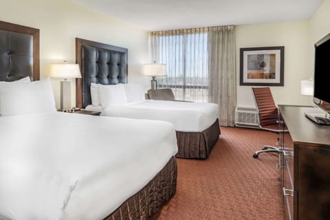 Desk, laptop workspace, blackout drapes, iron/ironing board