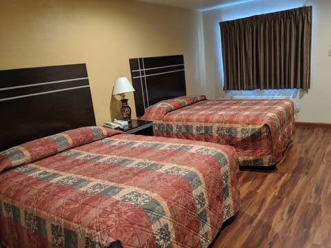 Standard Room, 2 Queen Beds, Smoking | Desk, iron/ironing board, free WiFi, bed sheets