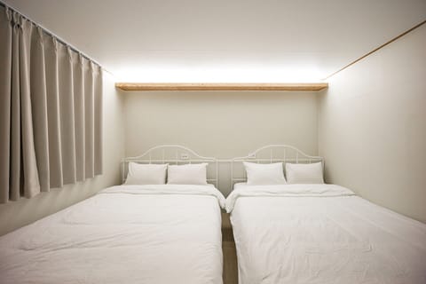 Basic Quadruple Room, 2 Queen Beds | Free WiFi