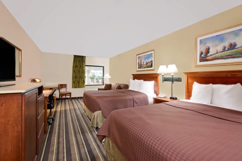 Standard Room, Multiple Beds, Pool View | Living area | 24-inch flat-screen TV with cable channels, TV