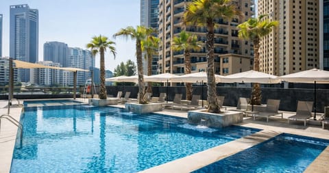 2 outdoor pools, open 8:00 AM to 10:00 PM, pool umbrellas, sun loungers