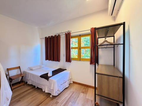 Family Triple Room, Garden View | Minibar, laptop workspace, WiFi (free)