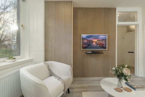 Apartment | Living area | 24-inch Smart TV with digital channels