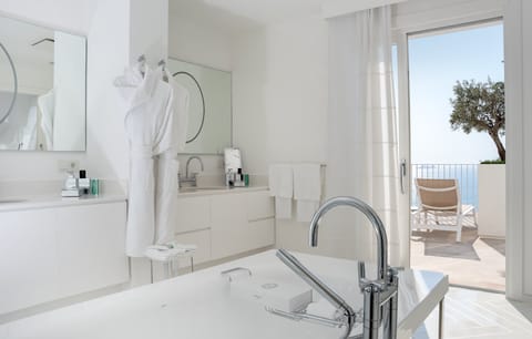 Suite (Angelina) | Bathroom | Designer toiletries, hair dryer, bathrobes, slippers