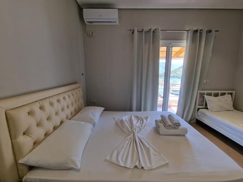 Deluxe Triple Room, Balcony, Lake View | Free WiFi, bed sheets