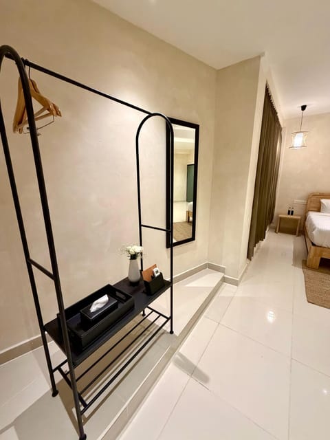 Signature Suite Room | Living area | 43-inch LCD TV with digital channels