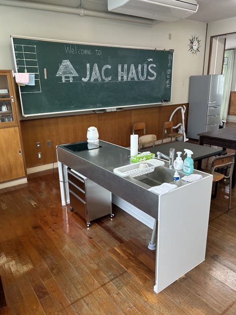 Full-size fridge, microwave, stovetop, cookware/dishes/utensils
