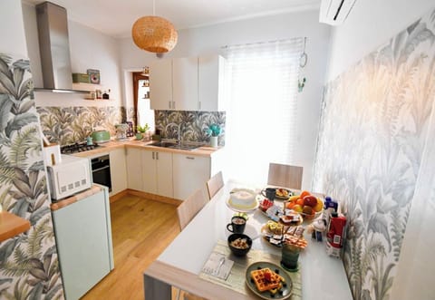 Comfort Apartment | Private kitchen | Full-size fridge, microwave, oven, stovetop