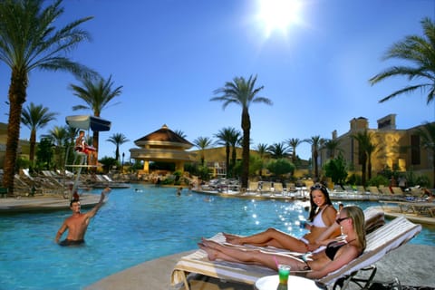 Outdoor pool, pool umbrellas, sun loungers