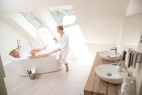 Junior Suite, 1 Bedroom, Sauna | Bathroom | Eco-friendly toiletries, hair dryer, bathrobes, slippers