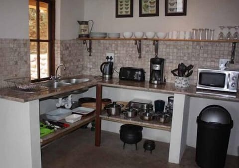 Fridge, microwave, stovetop, cookware/dishes/utensils