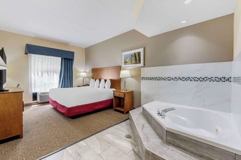 Suite, 1 King Bed, Non Smoking, Jetted Tub | Pillowtop beds, iron/ironing board, cribs/infant beds, WiFi