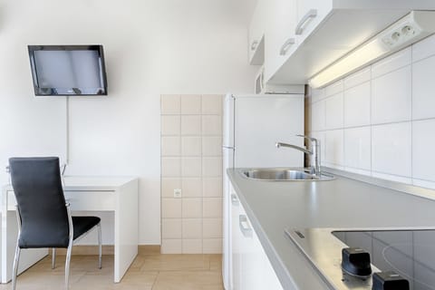 Apartment, Balcony, Sea View | Private kitchenette | Mini-fridge, electric kettle