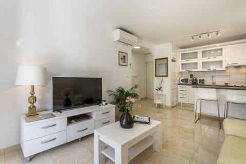 Deluxe Apartment, 1 Bedroom | Living area | LCD TV