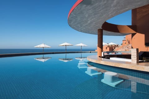 2 bars/lounges, 2 poolside bars, swim-up bar