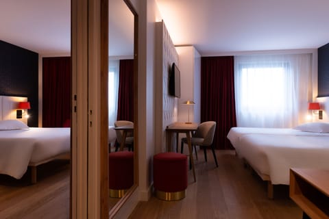 Family Room | Premium bedding, in-room safe, desk, laptop workspace