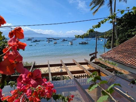 Suite, Multiple Beds, Sea View | Beach | Beach nearby, white sand