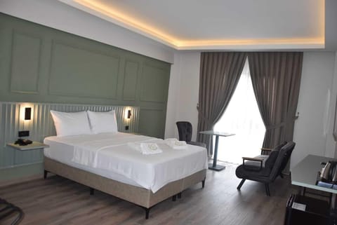 Standard Double Room, Non Smoking, Housekeeping | In-room safe, desk, laptop workspace, blackout drapes
